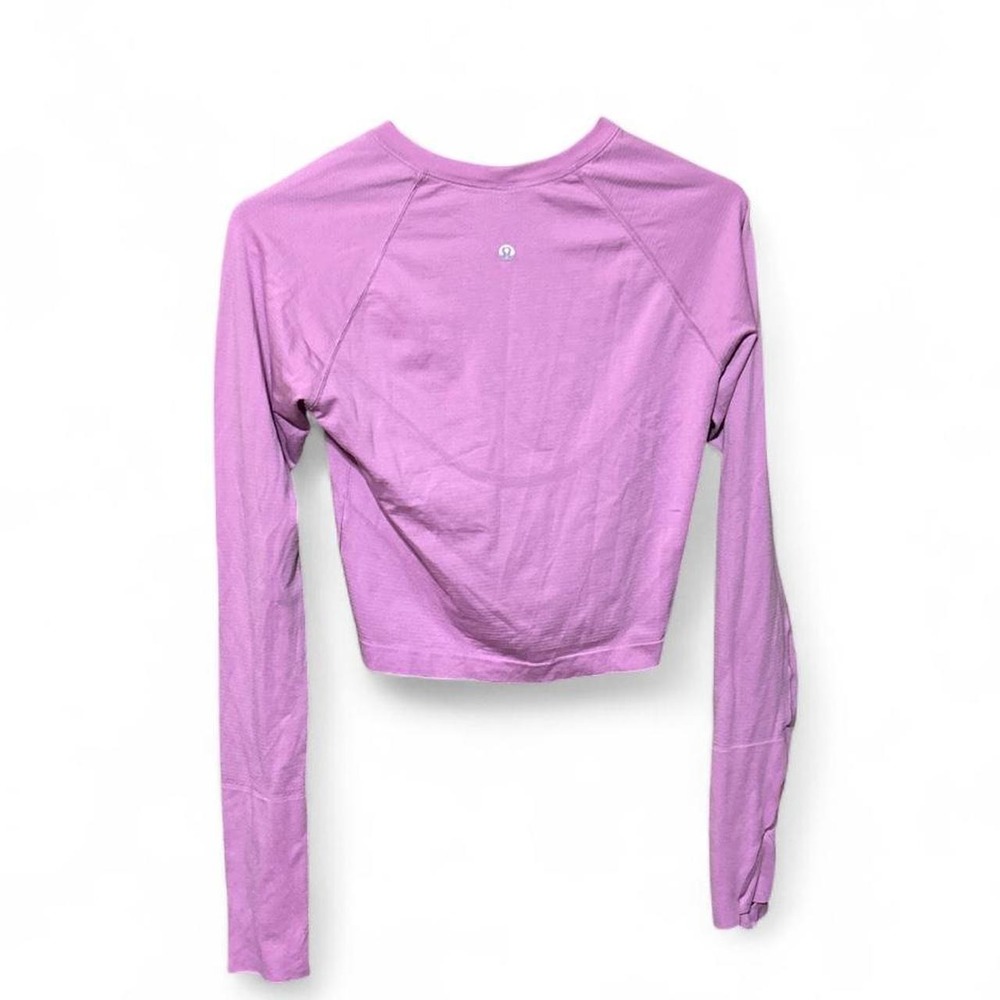 Lululemon cropped athletic long-sleeve top in a pink hue - S